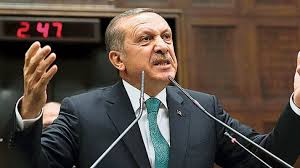 Turkey's Erdogan takes tough EU line after PM quits