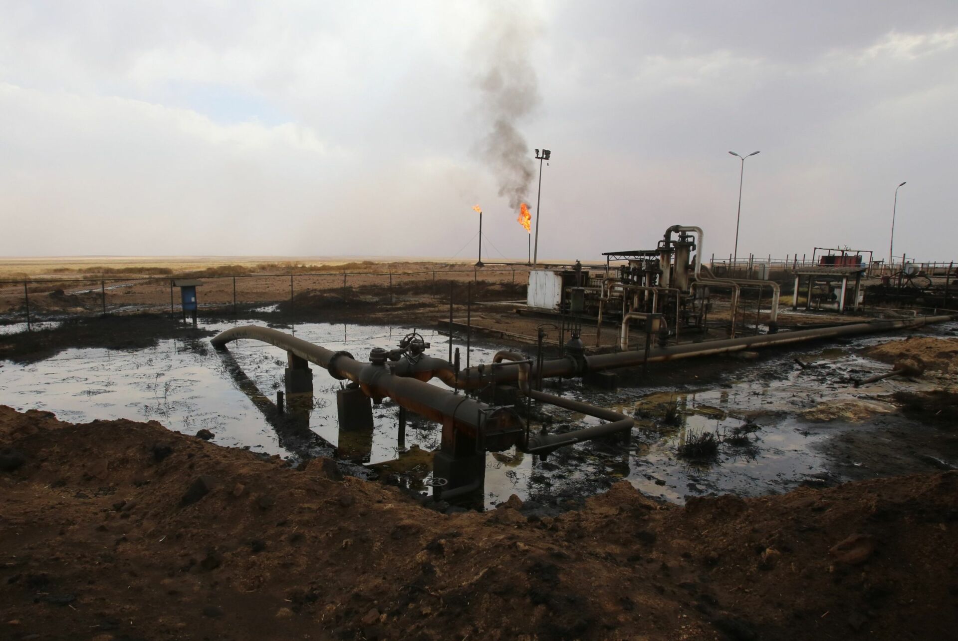 Oil well pumps are seen in the Rmeilane oil field in Syria's northerneastern Hasakeh province on July 15, 2015